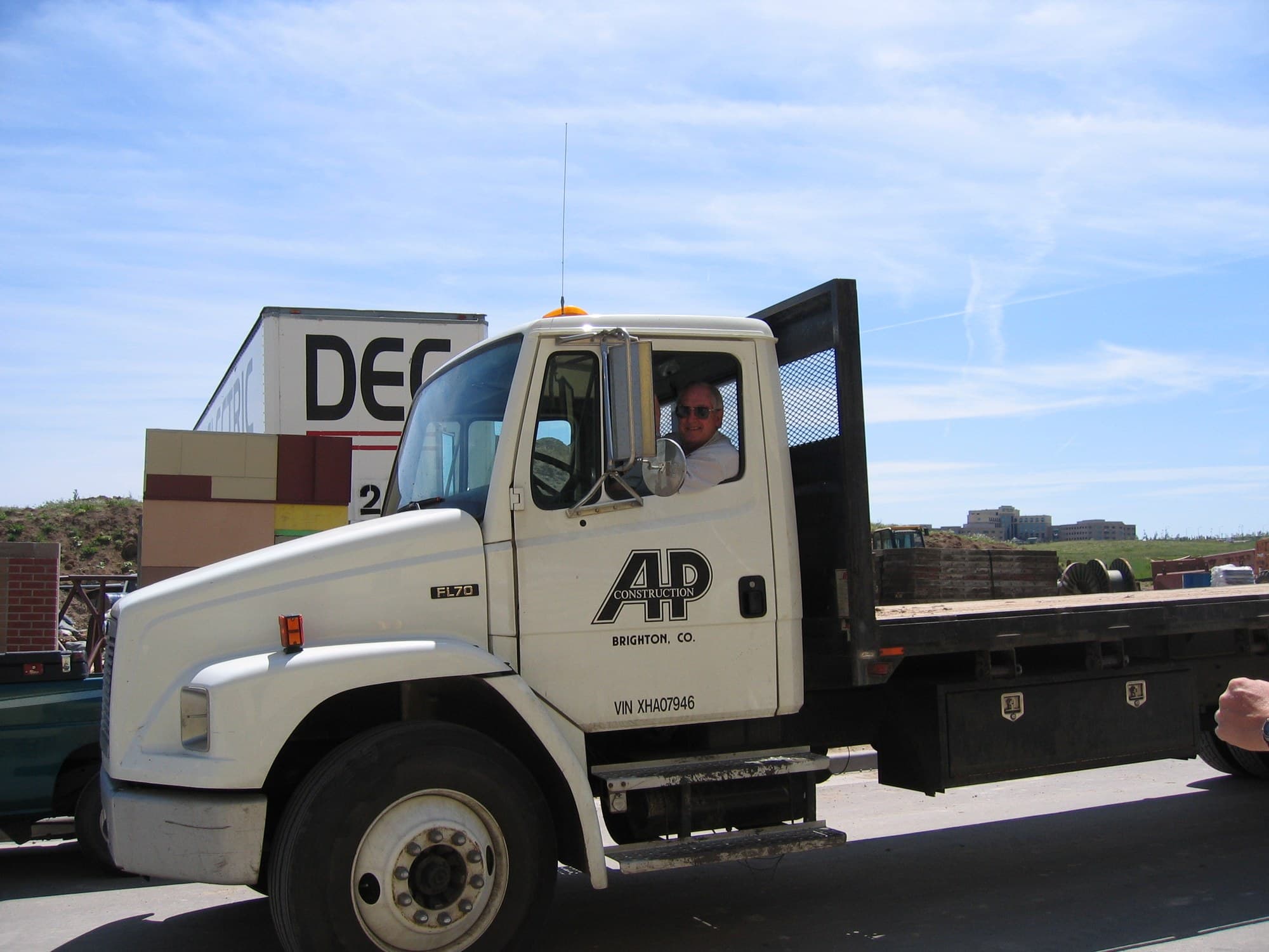 AP Construction crew and equipment on a Front Range jobsite